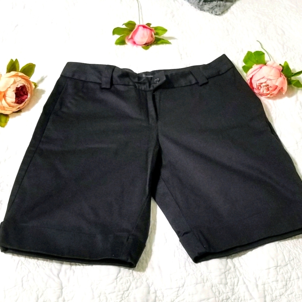 The limited long black shorts size 8